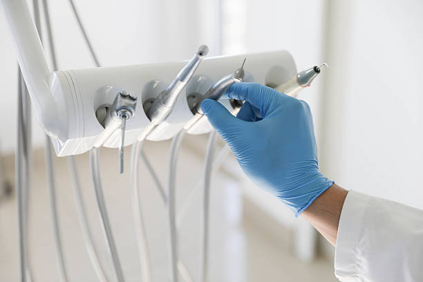 Professional Root Canal Treatment technician working in Waelder, TX